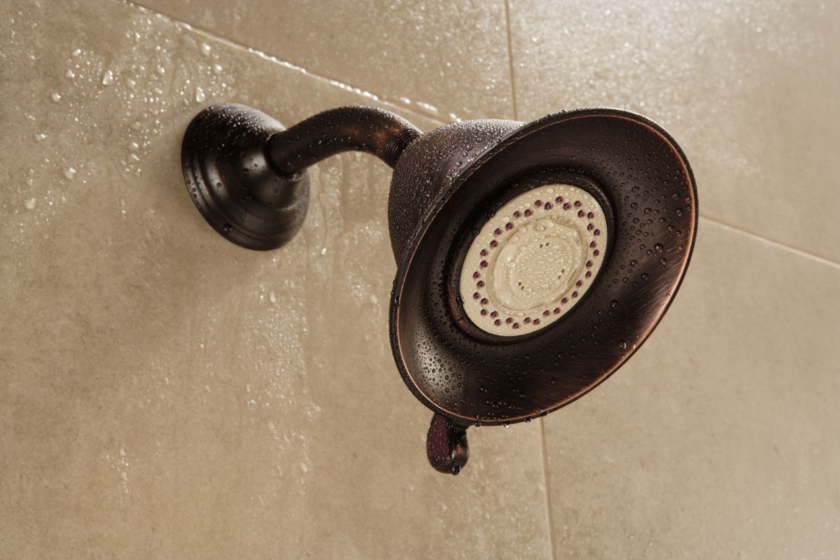 delta rp34355 installed shower head in venetian bronze 1399