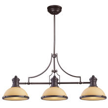 Chadwick Three-Light Kitchen Island Fixture in Oiled Bronze Finish with Amber Shade
