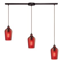 Hammered Glass 3 Light 36" Wide Linear Pendant with Rectangle Canopy and Red Hammered Glass Shades