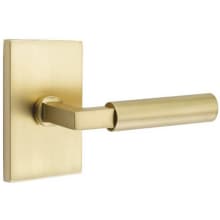 Hercules Right Handed Passage Door Lever Set with Modern Rectangular Rose from the Brass Modern Collection