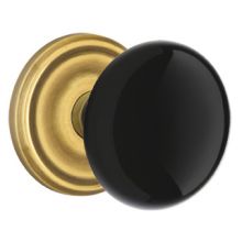 Ebony Porcelain Privacy Door Knobset with Brass Rosette and the CF Mechanism