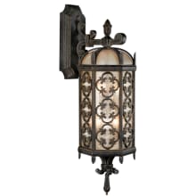 Costa del Sol Two-Light Outdoor Wall Sconce with Quatrefoil Details and Subtle Iridescent Textured Glass Shade