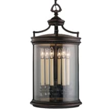 Louvre Six-Light Outdoor Pendant with Antiqued Candles and Clear Blown Glass Shade