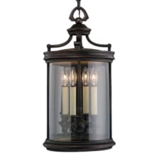 Louvre Four-Light Outdoor Pendant with Antiqued Candles and Clear Blown Glass Shade