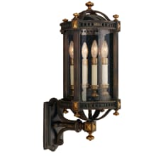 Beekman Place Four-Light Outdoor Wall Sconce with Hand-Blown Seedy Glass Shade