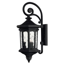 Raley 3 Light 25-1/2" Tall Outdoor Lantern Wall Sconce with Clear Water Glass