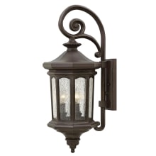 Raley 3 Light 25-1/2" Tall Outdoor Wall Sconce with Clear Seedy Glass