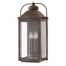 Anchorage 4 Light 25" Tall Heritage Outdoor Wall Sconce with Clear Glass Panels