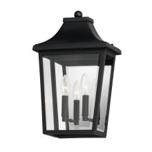 Sutton 2 Light 17" Tall Outdoor Wall Sconce with Clear Glass Shade