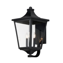Sutton 3 Light 25" Tall Outdoor Wall Sconce with Clear Glass Shade