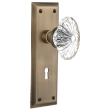 Oval Fluted Crystal Solid Brass Privacy Door Knob Set with New York Rose, Keyhole and 2-3/4" Backset