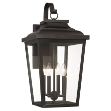 Irvington Manor 4 Light 24" Tall Outdoor Wall Sconce with Clear Glass