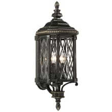 Bexley Manor 4 Light 32" Tall Outdoor Wall Sconce with Clear Beveled Glass