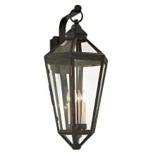 Calabasas 4 Light 33" Tall Outdoor Wall Sconce with Clear Glass Lantern Shade