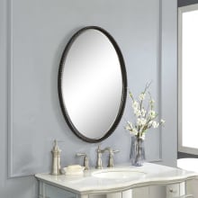 Sherise 32" X 22" Oval Vanity Bathroom Wall Mirror with Hand Forged Iron Beaded Frame in Bronze
