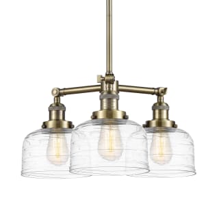A thumbnail of the Innovations Lighting 207-11-22 Bell Chandelier Antique Brass / Clear Deco Swirl