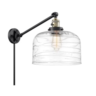A thumbnail of the Innovations Lighting 237-13-12-L Bell Sconce Black Antique Brass / Clear Deco Swirl