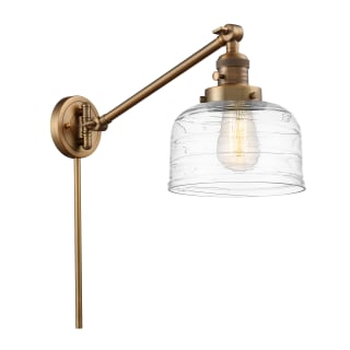A thumbnail of the Innovations Lighting 237-25-8 Bell Sconce Brushed Brass / Clear Deco Swirl