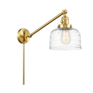 A thumbnail of the Innovations Lighting 237-25-8 Bell Sconce Satin Gold / Clear Deco Swirl