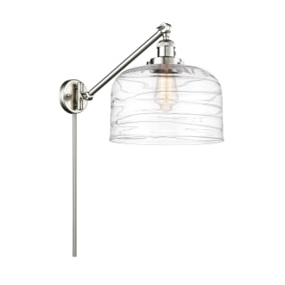 A thumbnail of the Innovations Lighting 237--13-12-L Bell Sconce Brushed Satin Nickel / Clear Deco Swirl