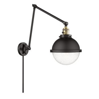 A thumbnail of the Innovations Lighting 238-14-9 Hampden Sconce Black Antique Brass / Seedy