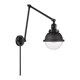 A thumbnail of the Innovations Lighting 238-11-7 Hampden Sconce Matte Black / Clear