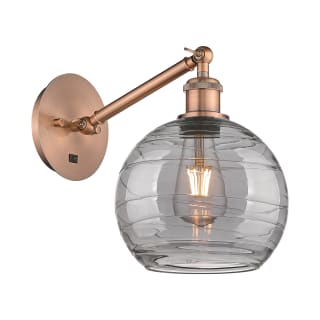 A thumbnail of the Innovations Lighting 317-1W 10 8 Athens Deco Swirl Sconce Antique Copper / Light Smoke Deco Swirl