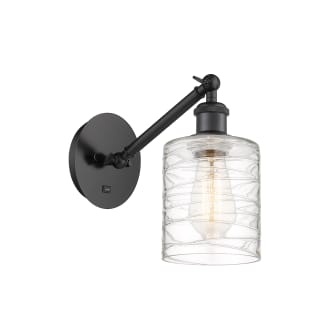 A thumbnail of the Innovations Lighting 317-1W-13-5 Cobbleskill Sconce Matte Black / Deco Swirl