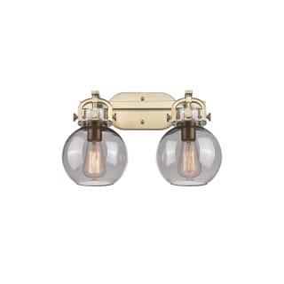 A thumbnail of the Innovations Lighting 410-2W-12-17 Newton Sphere Vanity Brushed Brass / Plated Smoke