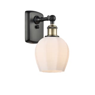 A thumbnail of the Innovations Lighting 516-1W-10-6 Norfolk Sconce Black Antique Brass / Matte White