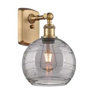 A thumbnail of the Innovations Lighting 516-1W-11-8 Athens Deco Swirl Sconce Brushed Brass / Light Smoke Deco Swirl