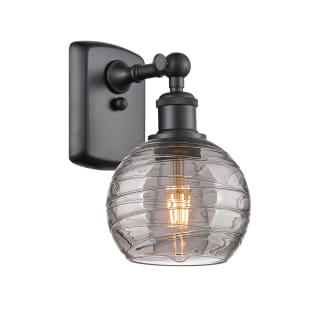 A thumbnail of the Innovations Lighting 516-1W-10-6 Athens Deco Swirl Sconce Matte Black / Light Smoke Deco Swirl