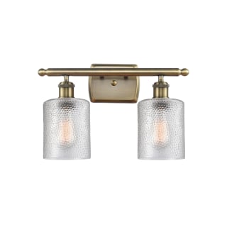 A thumbnail of the Innovations Lighting 516-2W-9-16 Cobbleskill Vanity Clear / Antique Brass