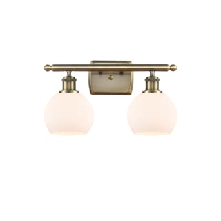 A thumbnail of the Innovations Lighting 516-2W-10-16 Athens Vanity Antique Brass / Matte White