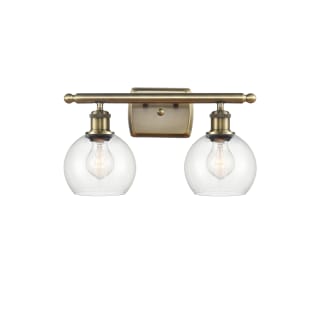 A thumbnail of the Innovations Lighting 516-2W-9-16 Athens Vanity Antique Brass / Clear