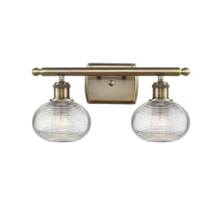 A thumbnail of the Innovations Lighting 516-2W-8-16 Ithaca Vanity Antique Brass / Clear Ithaca