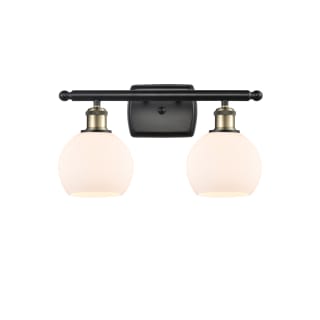 A thumbnail of the Innovations Lighting 516-2W-10-16 Athens Vanity Black Antique Brass / Matte White