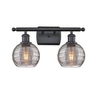 A thumbnail of the Innovations Lighting 516-2W-10-16 Athens Deco Swirl Vanity Matte Black / Light Smoke Deco Swirl