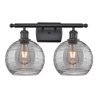 A thumbnail of the Innovations Lighting 516-2W-11-18 Athens Deco Swirl Vanity Matte Black / Light Smoke Deco Swirl