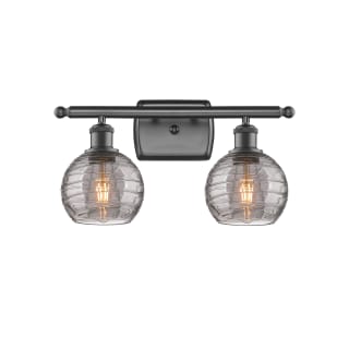 A thumbnail of the Innovations Lighting 516-2W-10-16 Athens Deco Swirl Vanity Oil Rubbed Bronze / Light Smoke Deco Swirl