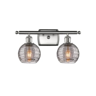 A thumbnail of the Innovations Lighting 516-2W-10-16 Athens Deco Swirl Vanity Brushed Satin Nickel / Light Smoke Deco Swirl