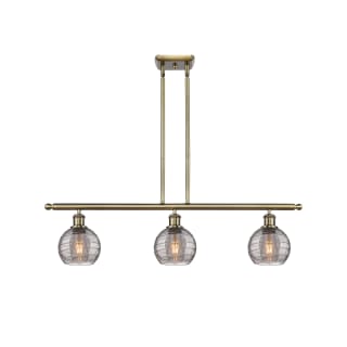 A thumbnail of the Innovations Lighting 516-3I 9 36 Athens Deco Swirl Chandelier Antique Brass / Light Smoke Deco Swirl