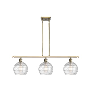 A thumbnail of the Innovations Lighting 516-3I-11-36 Athens Linear Antique Brass / Clear Deco Swirl