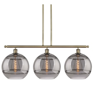 A thumbnail of the Innovations Lighting 516-3I-14-39 Rochester Pendant Antique Brass / Light Smoke