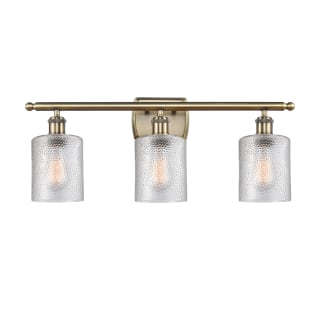 A thumbnail of the Innovations Lighting 516-3W-10-26 Cobbleskill Vanity Clear / Antique Brass