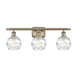 A thumbnail of the Innovations Lighting 516-3W-11-26 Athens Vanity Antique Brass / Clear Deco Swirl