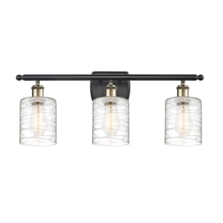 A thumbnail of the Innovations Lighting 516-3W-10-26 Cobbleskill Vanity Black Antique Brass / Deco Swirl