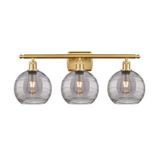 A thumbnail of the Innovations Lighting 516-3W-11-28-Athens Deco Swirl-Vanity Light Satin Gold / Light Smoke Deco Swirl