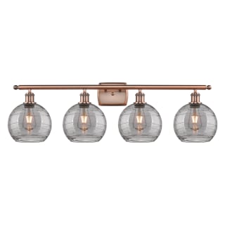 A thumbnail of the Innovations Lighting 516-4W 11 38 Athens Deco Swirl Vanity Antique Copper / Light Smoke Deco Swirl