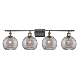 A thumbnail of the Innovations Lighting 516-4W 11 38 Athens Deco Swirl Vanity Black Antique Brass / Light Smoke Deco Swirl